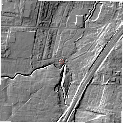 Shaded relief map of the ground around YO244JX, computed from Environment Agency LiDAR. The ground here sits at about 12 m above sea level and falls 11 m across the surrounding 800 m. Surface water reaching this point runs off ground lying to the north-west, 6.4 m higher.