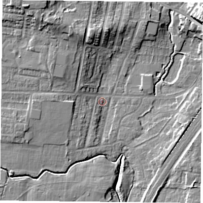 Shaded relief map of the ground around YO244LB, computed from Environment Agency LiDAR. The ground here sits at about 11 m above sea level and falls 16 m across the surrounding 800 m. Surface water reaching this point runs off ground lying to the north-north-west, 11.0 m higher.