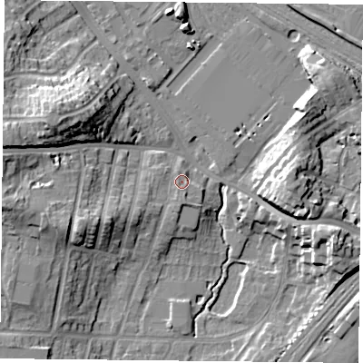 Shaded relief map of the ground around YO244LF, computed from Environment Agency LiDAR. The ground here sits at about 13 m above sea level and falls 18 m across the surrounding 800 m. Surface water reaching this point runs off ground lying to the south-west, 2.3 m higher.