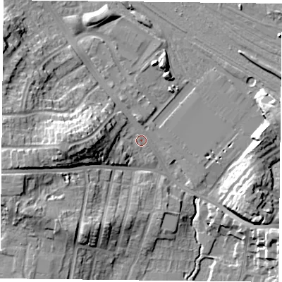 Shaded relief map of the ground around YO244TT, computed from Environment Agency LiDAR. The ground here sits at about 11 m above sea level and falls 18 m across the surrounding 800 m. Surface water reaching this point runs off ground lying to the north, 6.0 m higher.