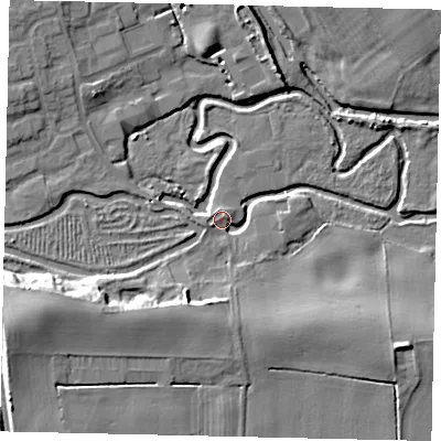 Shaded relief map of the ground around YO256XL, computed from Environment Agency LiDAR. The ground here sits at about 12 m above sea level and falls 16 m across the surrounding 800 m. Surface water reaching this point runs off ground lying to the south-south-west, 8.7 m higher.