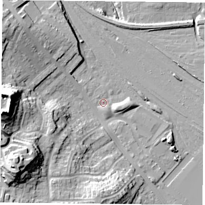 Shaded relief map of the ground around YO264QP, computed from Environment Agency LiDAR. The ground here sits at about 12 m above sea level and falls 34 m across the surrounding 800 m. Surface water reaching this point runs off ground lying to the west, 27.8 m higher.