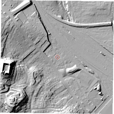 Shaded relief map of the ground around YO264QR, computed from Environment Agency LiDAR. The ground here sits at about 12 m above sea level and falls 34 m across the surrounding 800 m. Surface water reaching this point runs off ground lying to the north-north-west, 5.8 m higher.