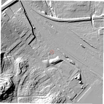 Shaded relief map of the ground around YO264QW, computed from Environment Agency LiDAR. The ground here sits at about 12 m above sea level and falls 30 m across the surrounding 800 m. Surface water reaching this point runs off ground lying to the south-west, 23.8 m higher.