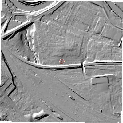 Shaded relief map of the ground around YO264XT, computed from Environment Agency LiDAR. The ground here sits at about 11 m above sea level and falls 14 m across the surrounding 800 m. Surface water reaching this point runs off ground lying to the east-south-east, 6.4 m higher.