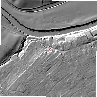 Shaded relief map of the ground around YO266HS, computed from Environment Agency LiDAR. The ground here sits at about 13 m above sea level and falls 14 m across the surrounding 800 m. Surface water reaching this point runs off ground lying to the south-east, 7.7 m higher.