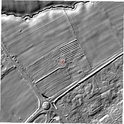 Shaded relief map of the ground around YO301XJ, computed from Environment Agency LiDAR. The ground here sits at about 12 m above sea level and falls 6 m across the surrounding 800 m. Surface water reaching this point runs off ground lying to the south-west, 0.8 m higher.