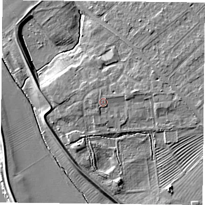 Shaded relief map of the ground around YO305FH, computed from Environment Agency LiDAR. The ground here sits at about 12 m above sea level and falls 9 m across the surrounding 800 m. Surface water reaching this point runs off ground lying to the west, 1.3 m higher.