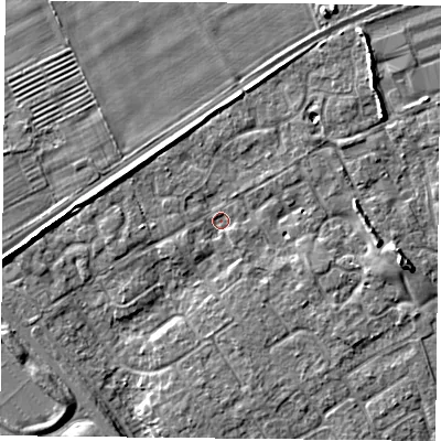 Shaded relief map of the ground around YO305NA, computed from Environment Agency LiDAR. The ground here sits at about 12 m above sea level and falls 6 m across the surrounding 800 m. Surface water reaching this point runs off ground lying to the north-east, 3.6 m higher.