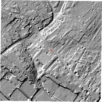 Shaded relief map of the ground around YO306BD, computed from Environment Agency LiDAR. The ground here sits at about 12 m above sea level and falls 12 m across the surrounding 800 m. Surface water reaching this point runs off ground lying to the south-east, 4.5 m higher.