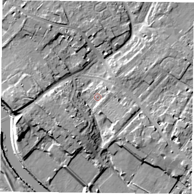Shaded relief map of the ground around YO306LJ, computed from Environment Agency LiDAR. The ground here sits at about 12 m above sea level and falls 11 m across the surrounding 800 m. Surface water reaching this point runs off ground lying to the east-north-east, 2.8 m higher.