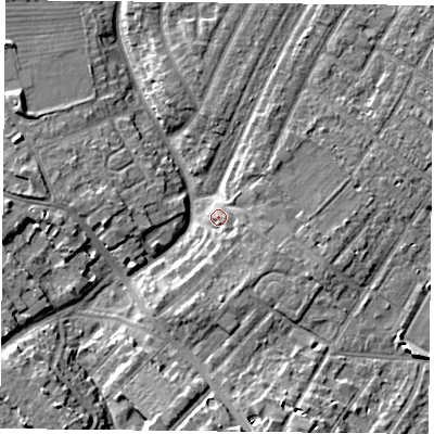 Shaded relief map of the ground around YO306PS, computed from Environment Agency LiDAR. The ground here sits at about 12 m above sea level and falls 7 m across the surrounding 800 m. Surface water reaching this point runs off ground lying to the east, 5.2 m higher.