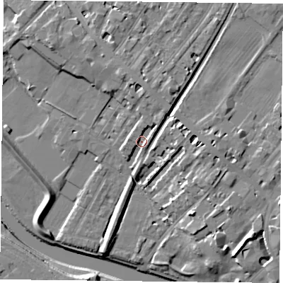 Shaded relief map of the ground around YO307DH, computed from Environment Agency LiDAR. The ground here sits at about 12 m above sea level and falls 15 m across the surrounding 800 m. Surface water reaching this point runs off ground lying to the north, 5.5 m higher.