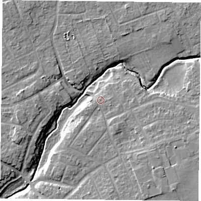 Shaded relief map of the ground around YO310LQ, computed from Environment Agency LiDAR. The ground here sits at about 12 m above sea level and falls 8 m across the surrounding 800 m. Surface water reaching this point runs off ground lying to the east-south-east, 1.0 m higher.