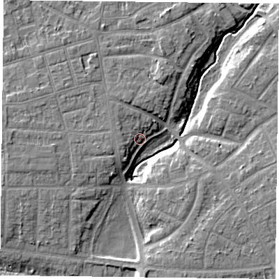 Shaded relief map of the ground around YO310SF, computed from Environment Agency LiDAR. The ground here sits at about 12 m above sea level and falls 8 m across the surrounding 800 m. Surface water reaching this point runs off ground lying to the west-north-west, 7.2 m higher.