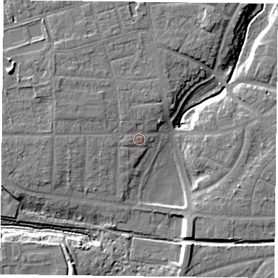 Shaded relief map of the ground around YO310UB, computed from Environment Agency LiDAR. The ground here sits at about 13 m above sea level and falls 11 m across the surrounding 800 m. Surface water reaching this point runs off ground lying to the north-west, 2.8 m higher.