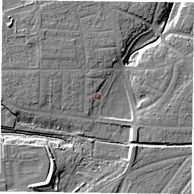 Shaded relief map of the ground around YO310UD, computed from Environment Agency LiDAR. The ground here sits at about 12 m above sea level and falls 11 m across the surrounding 800 m. Surface water reaching this point runs off ground lying to the north-north-west, 2.6 m higher.