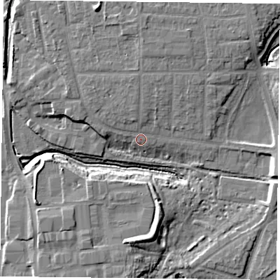 Shaded relief map of the ground around YO310UW, computed from Environment Agency LiDAR. The ground here sits at about 12 m above sea level and falls 12 m across the surrounding 800 m. Surface water reaching this point runs off ground lying to the south, 10.0 m higher.