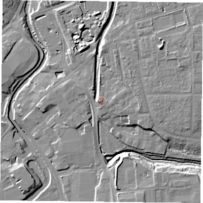 Shaded relief map of the ground around YO317XQ, computed from Environment Agency LiDAR. The ground here sits at about 13 m above sea level and falls 12 m across the surrounding 800 m. Surface water reaching this point runs off ground lying to the west, 0.9 m higher.