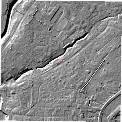 Shaded relief map of the ground around YO319AJ, computed from Environment Agency LiDAR. The ground here sits at about 13 m above sea level and falls 7 m across the surrounding 800 m. Surface water reaching this point runs off ground lying to the south-south-east, 1.6 m higher.