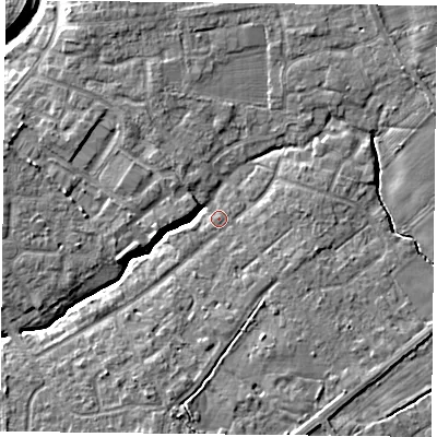 Shaded relief map of the ground around YO319AL, computed from Environment Agency LiDAR. The ground here sits at about 13 m above sea level and falls 7 m across the surrounding 800 m. Surface water reaching this point runs off ground lying to the south, 1.8 m higher.