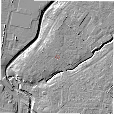 Shaded relief map of the ground around YO319AY, computed from Environment Agency LiDAR. The ground here sits at about 13 m above sea level and falls 8 m across the surrounding 800 m. Surface water reaching this point runs off ground lying to the north, 1.3 m higher.