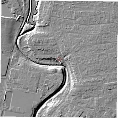 Shaded relief map of the ground around YO319BS, computed from Environment Agency LiDAR. The ground here sits at about 13 m above sea level and falls 7 m across the surrounding 800 m. Surface water reaching this point runs off ground lying to the north-east, 2.2 m higher.