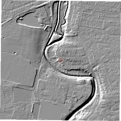 Shaded relief map of the ground around YO319HW, computed from Environment Agency LiDAR. The ground here sits at about 12 m above sea level and falls 7 m across the surrounding 800 m. Surface water reaching this point runs off ground lying to the north-north-east, 2.8 m higher.