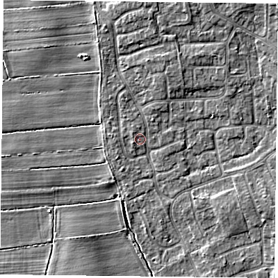 Shaded relief map of the ground around YO322WW, computed from Environment Agency LiDAR. The ground here sits at about 15 m above sea level and falls 4 m across the surrounding 800 m. Surface water reaching this point runs off ground lying to the north, 2.3 m higher.