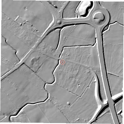 Shaded relief map of the ground around YO329TG, computed from Environment Agency LiDAR. The ground here sits at about 13 m above sea level and falls 12 m across the surrounding 800 m. Surface water reaching this point runs off ground lying to the south-east, 11.2 m higher.
