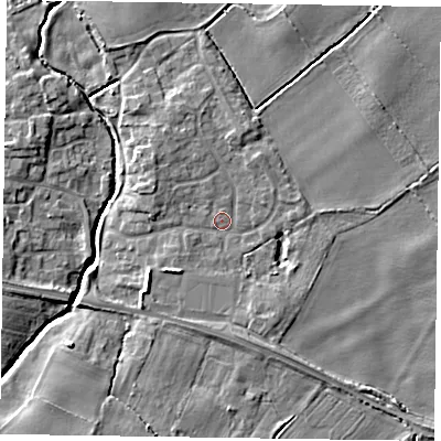 Shaded relief map of the ground around YO415PS, computed from Environment Agency LiDAR. The ground here sits at about 12 m above sea level and falls 6 m across the surrounding 800 m. Surface water reaching this point runs off ground lying to the north-west, 3.2 m higher.