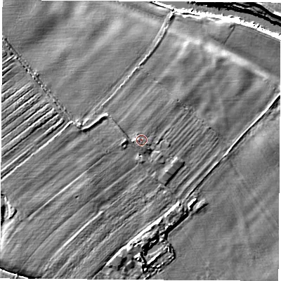 Shaded relief map of the ground around YO519HA, computed from Environment Agency LiDAR. The ground here sits at about 15 m above sea level and falls 7 m across the surrounding 800 m. Surface water reaching this point runs off ground lying to the west, 0.7 m higher.