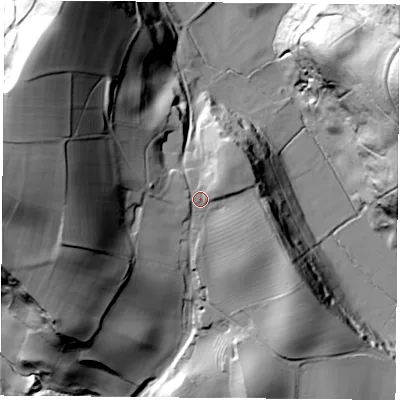Shaded relief map of the ground around YO614BL, computed from Environment Agency LiDAR. The ground here sits at about 128 m above sea level and falls 85 m across the surrounding 800 m. Surface water reaching this point runs off ground lying to the north-east, 7.6 m higher.