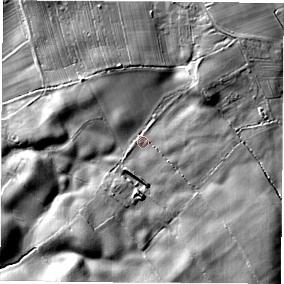 Shaded relief map of the ground around YO72PZ, computed from Environment Agency LiDAR. The ground here sits at about 75 m above sea level and falls 18 m across the surrounding 800 m. Surface water reaching this point runs off ground lying to the north-east, 9.8 m higher.